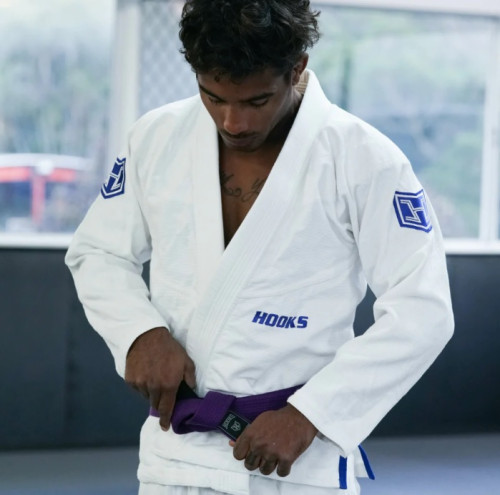Brazilian jiu-jitsu is one of the most intense martial arts. Earlier the art was similar to judo but with time, it came with various techniques, moves, submission, and grappling. It has an effective game system created for self-defense. Also, the game teaches calmness and respect for others. It is a traditional uniform that embodies the essence of BJJ. It is worn during training and competition time. Wearing a uniform offers numerous advantages and opportunities to control the opponent. The uniform consists of a jacket, top, and pants. Wearing GI makes you feel less tired when you go for long matches. Moreover, it keeps you dry, creates friction, and promotes better escape. Get the best and most compatible apparel available at Hooks Jiujitsu. We have kimonos that come in various ranges and comfort from lightest to pro light to premium. We tailored BJJ GI with triple-reinforced stitching and no back seam with one-piece construction. Our store is equipped with an extensive range of BJJ GI, rash guards, kimonos, apparel, and accessories that suit beginners and competitors. If you run your jiu-jitsu academy, contact us to get the whole pricing for all kinds of apparel. Order today! Visit https://hooksbrand.com/collections/bjj-gis