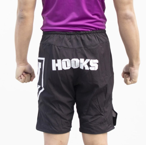 Hooks Jiujitsu includes a huge assortment of fighting shorts. Regardless if you are a practitioner or enrolled in training or experienced, you will get plenty of choices for the same. Grappling shorts, also known as grappling tights or compression shorts, are specialized athletic apparel worn by individuals participating in various grappling sports such as Brazilian Jiu-Jitsu (BJJ), submission wrestling, and mixed martial arts (MMA). These shorts are designed to provide comfort, flexibility, and protection during intense grappling and ground-based activities. We set extremely high standards for grappling shorts. Our shorts are meant to last an eternity with double stitching throughout. Our grappling shorts offer a layer of protection against mat burns and other minor abrasions that can occur during ground-based training. Additionally, they help maintain a certain level of hygiene by preventing direct skin-to-skin contact between participants. Buy it today and stay in good shape while training. Shop now! Visit https://hooksbrand.com/collections/shorts