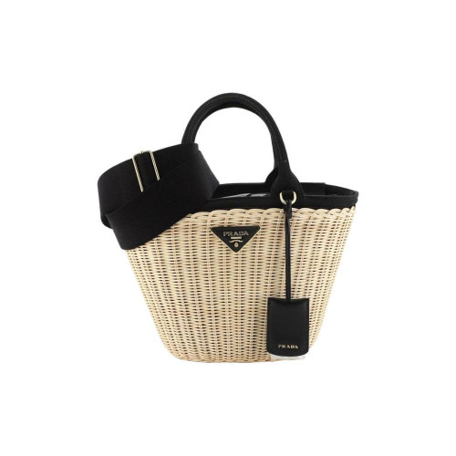 Elevate your style with our charming Wicker Basket Bag. Crafted to perfection, this bag effortlessly combines vintage elegance with contemporary flair. Its intricately woven wicker design exudes artisanal craftsmanship, while the spacious interior offers practicality for your essentials. Embrace a touch of nature's beauty and timeless fashion with our Wicker Basket Bag. Order now at https://madamford.com/product/wicker-basket-bag/